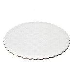 White scalloped circle cake board from Whalen Packaging in various sizes, featuring a decorative scalloped edge and smooth surface.