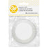 White Wilton baking cups cupcake liners set, showing smooth paper liners with fluted edges for baking and decorating.