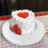 Fat Daddio's heart-shaped novelty cake pan with non-stick surface, perfect for baking romantic-themed cakes.