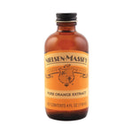 Nielsen-Massey Pure Orange Extract bottle in 2 oz and 4 oz sizes, featuring clear glass bottles with orange-colored labels and caps.