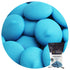 Blue chocolate melts from Merckens by CK Products, shown in a close-up of smooth, glossy baby blue confectionery candy.
