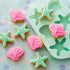 Moldes para dulces de conchas y estrellas de mar Wilton