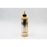 Chefmaster Metallic Airbrush with gold, silver, and pearl colors in a 2oz bottle, showing the vibrant metallic liquid inside.