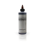 Chefmaster Airbrush Colors 2oz set with vibrant paint bottles, ideal for detailed airbrush decorating and cake decorating projects.