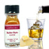 LorAnn Oils Butter Rum flavoring in a 1 dram bottle, showing the small glass container with a black cap and label.