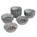 Set of 20 Fat Daddio's mini tartlet pans in various sizes, showing non-stick surface and metal construction for baking mini tarts.