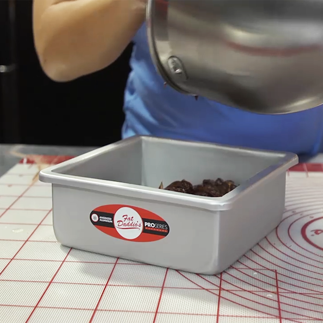 Fat Daddio's square cake pan in various sizes, made of durable metal, perfect for baking even, professional-quality cakes.
