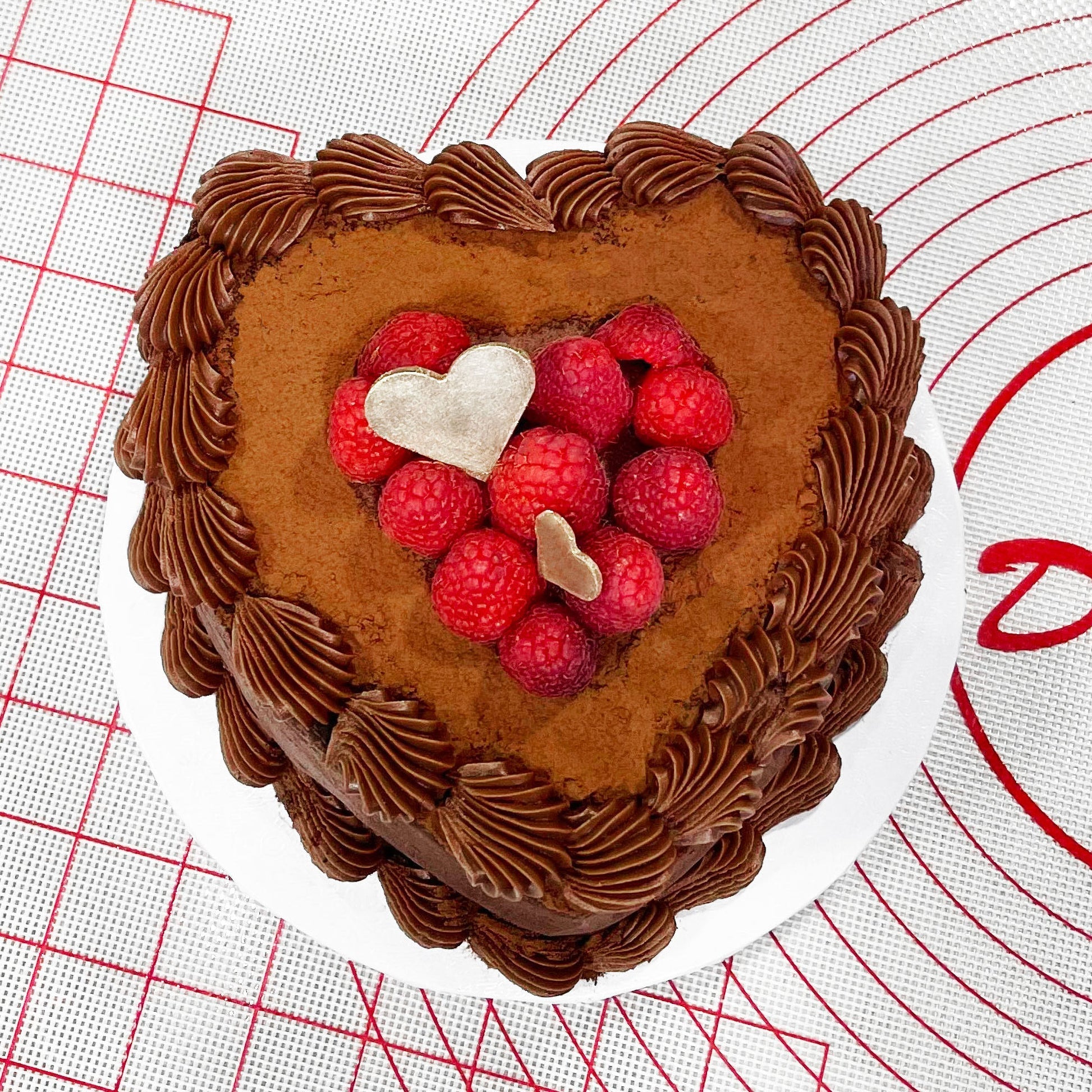 Fat Daddio's heart-shaped cake pan for baking, non-stick novelty cake pan with detailed heart design for special occasions.